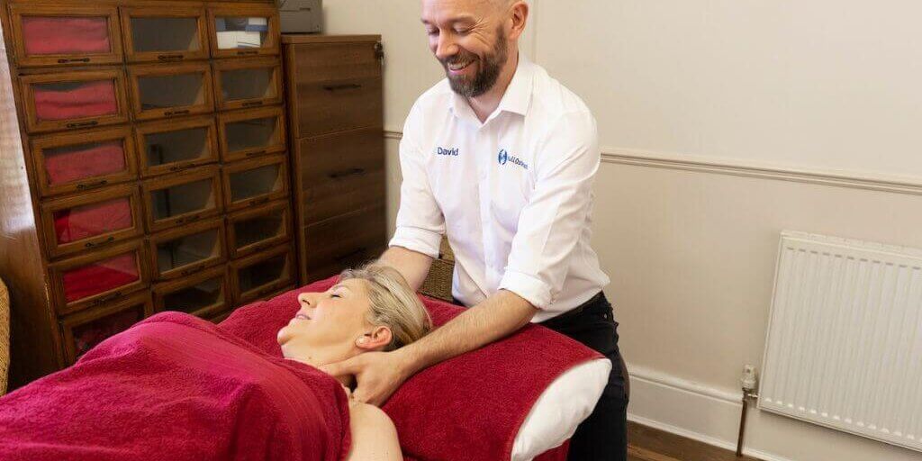 Osteopath David Pickering treating a patient